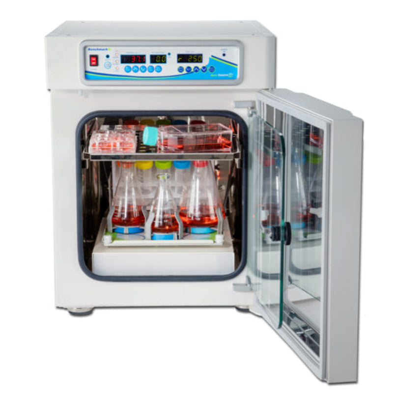 Benchmark Scientific H3501 Incu-Shaker CO2 Mini with door open, showing culture flasks, an upper shelf, and digital controls.