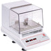 Ohaus ISICMBCDG incubating and cooling shaker with a clear cover, sample platform, and front digital control panel.