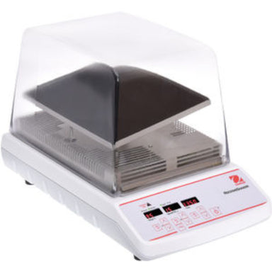 OHAUS ISRK04HDG incubating rocking shaker with a clear enclosure, black rocking tray, and front-mounted digital controls.