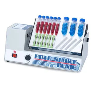 OHAUS Roto-Shake Genie e-RT22 SI-1100 US with an angled platform holding assorted sample tubes, a front speed dial, and a power switch.